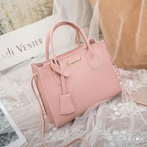 NWOT Beautiful soft pink colored shoulder bag